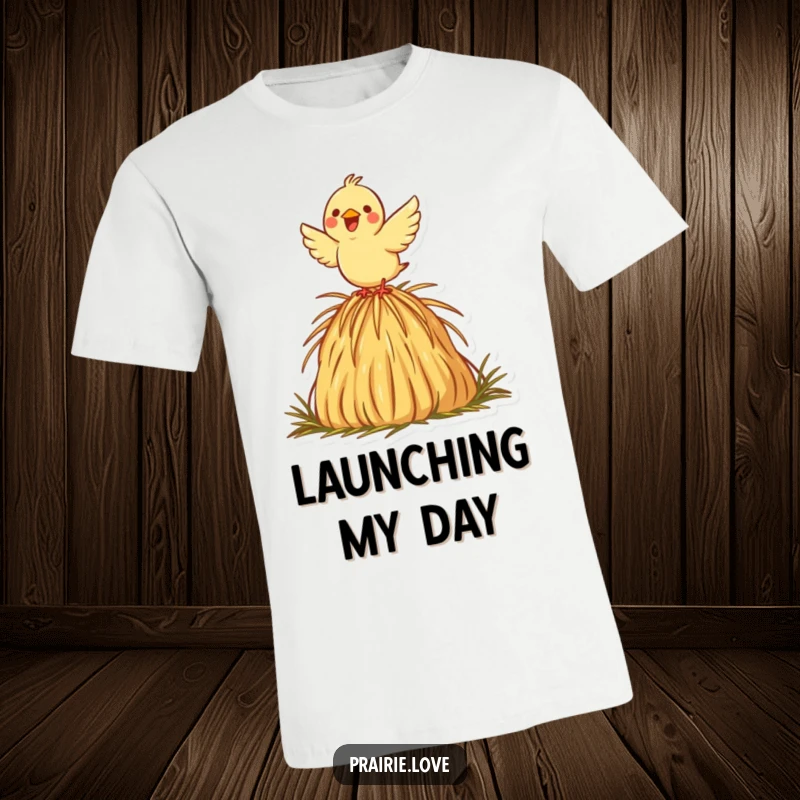 Funny t-shirt featuring a joyful bird taking flight from a decorative haystack icon, representing freedom and a lighthearted spirit.